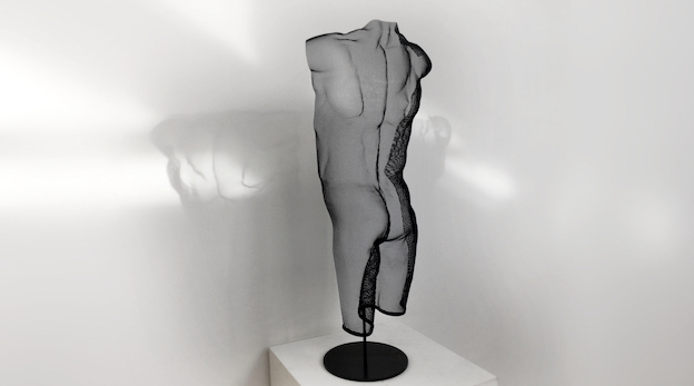 A body sculpture with daylight shadow projections